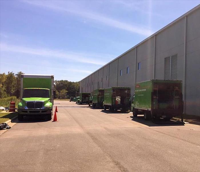 SERVPRO trucks parked behind a Cobb County business